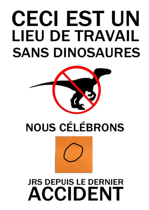 affiche indiquant que ceci est un lieu de travail sans dinosaures, ainsi que le nombre de jours depuis le dernier accident